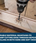 Dead Bang True 5/16 Inch Brad Point Drill Bit drilling into wood, showing clean hole and shavings, ideal for precise woodworking.
