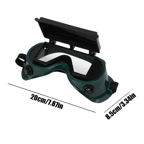 Heavy Duty Auto Darkening Welding Goggles With Snap Switch Lenses For Arc Cutting And Grinding Offer Rock Solid Eye Protection And All Day Comfort On Any Job Site, green goggles with lenses open, showing dual lenses.