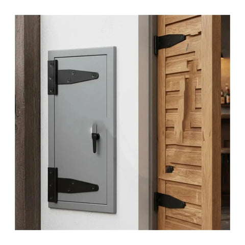 Black T Shape Iron Hinges With Screws Galvanized Strap Hinge for doors and gates, shown on a small gray door, 17 by 7 cm