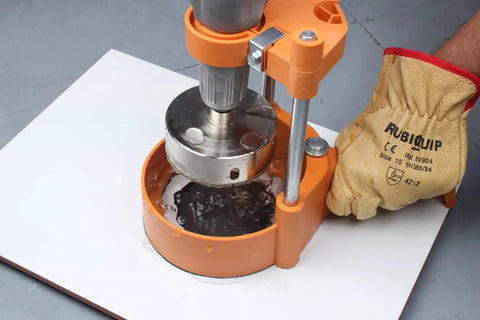 Precision Hole Drilling Guide with Suction Cup for Dry and Wet Cutting used on tile surface with diamond drill bit.