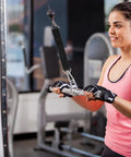 Pro Grade Gym Cable Pulley Attachment With Nylon Rope And Lifting Strap used by woman in home gym for strength training