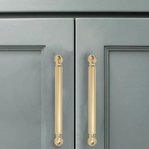 Champagne Bronze Solid Cabinet Pulls Set Of Ten, 5 Inch Center To Center Heavy Duty Cabinet Handles installed on gray cabinet doors