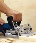 Plate Joiner For Quick, Precise Biscuit Joinery With Five Point Six Amp Motor And Eleven Thousand RPM, Cast Aluminum Pivot Fence in use.