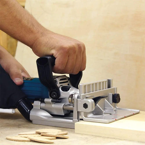 Plate Joiner For Quick, Precise Biscuit Joinery With Five Point Six Amp Motor And Eleven Thousand RPM, Cast Aluminum Pivot Fence in use.