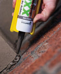 Applying Mor-Flexx Gray Acrylic Latex Caulk For Mortar, Stucco, And Grout Repair on brick surface using a caulk gun