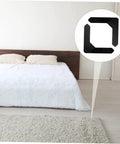Bedroom with 8 Pcs Slip Rug Tape Fixing Stickers for Hardwood Floors and Rugs, shown in corner detail.