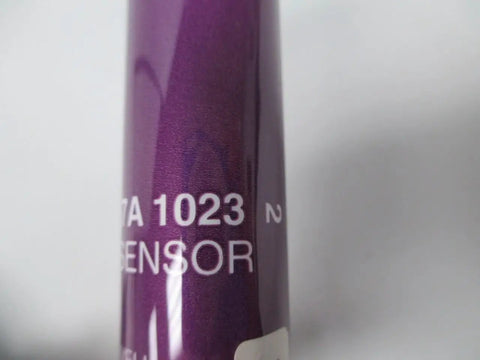 Close-up of a purple tube labeled "1023 Sensor," part of UV Sensor For 1/2 Inch Mounting, No-Fuss HVAC And Refrigeration Use, Universal Compatibility.