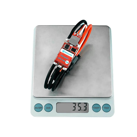 Beefy 70A Brushless RC ESC For 2-6S LiPo With 128KHz Control shown on a digital scale