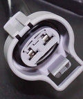 Close-up of connector for Plug And Swap Radiator Cooling Fan Assembly With Built In Motor Shroud And Bonus Coolant Tank Fits Toyota Prius C 2012 Through 2015 1.5L Hybrid.
