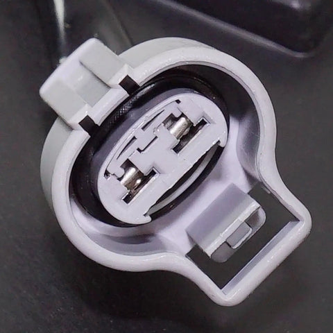 Close-up of connector for Plug And Swap Radiator Cooling Fan Assembly With Built In Motor Shroud And Bonus Coolant Tank Fits Toyota Prius C 2012 Through 2015 1.5L Hybrid.