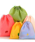 Waterproof Drawstring Storage Bags Set Of Five Made From PE Plastic Great For Travel Gym Swim Gear And Laundry Organization Quick Access And Easy Packing For Home Or On The Go in assorted colors and sizes.