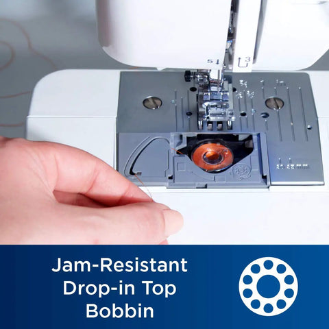 No Sweat Dead Simple Sewing Machine With 37 Built In Stitches And Automatic Needle Threader Including Drop In Top Bobbin view of jam-resistant drop-in top bobbin being threaded.