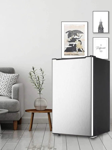 Sleek 3.2 Cu Ft Upright Mini Freezer With Adjustable Removable Shelves And Dope Silver Cabinet in modern living space.