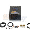 Front view: GlowShift 52mm oil pressure gauge kit with smoked lens display; includes sensor and mounting hardware.