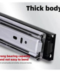Close-up of Rock Solid Undermount Drawer Slides For Kitchen Cabinets Smooth Gliding Cold Rolled Steel showing thick body and robust design.