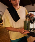 No Sweat Leakproof 20 Oz Hot Pink Shaker Bottle With Secure Hinge Lid And Fast Flow Spout Portable Tritan Protein Cup being filled.