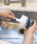 Heavy Duty Sink And Dish Scrub Brush With Safe Bristles, Perfect For Pots And Pans, cleaning a drain with non-scratch bristles.