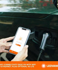 Top Tier Level Two Electric Vehicle Charger Delivers Hella Fast 48 Amp 11point5 Kilowatt Power With A Slick Screen Interface J1772 Connector And Long 25 Foot Heavy Duty Cable Built For Commercial Parking Lots Or Home Garages.