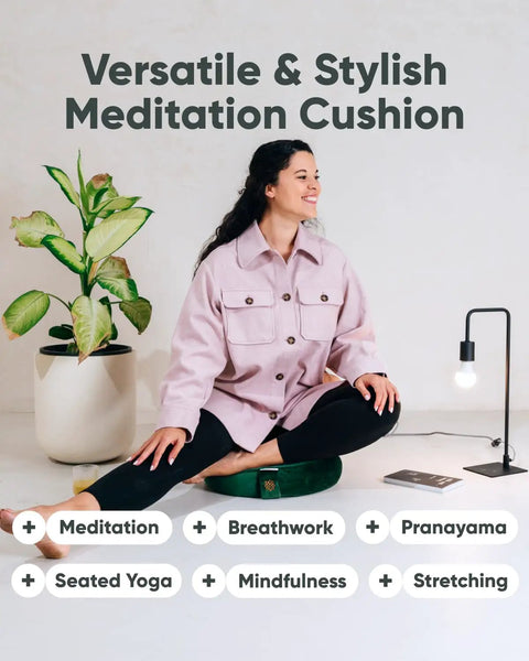 Lux Velvet Meditation Cushion For Posture Support, Large Zafu Yoga Floor Pillow With Buckwheat Hull Fill, Removable Washable Cover, Carry Handle, Round Green Cushion For Mindful Relaxation And Longer Sitting Sessions. Woman seated on green round meditation cushion for breathwork and stretching.