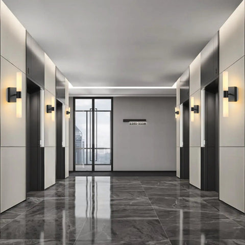 Set Of Two Dope Matte Black Wall Sconces With Frosted Glass Shades in modern hallway lighting.
