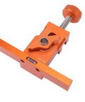 Adjustable Heavy Duty Aluminum Alloy Cabinet Door Mounting Jig With Built In Level Bubble And Non Slip Grip For Spot On Precise Installs and Worry Free Workshop Positioners, orange color, shown from above.