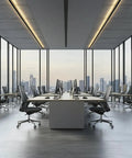 Office workspace with computers and ergonomic chairs on casters in a modern high-rise with skyline view.