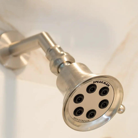 Anystream 360 Showerhead With Three Spray Settings, Consistent 2.5 GPM Flow in Brushed Nickel, wall-mounted view.