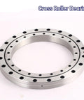 No Nonsense Cross Roller Bearing For Rotary Joints And CNC Machine Tables Smooth Rotation Killer Performance Heavy Duty Industrial Workhorse 130X205X25.4 Xsu080168 Model close-up showing smooth stainless steel finish and hole design.