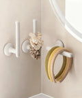 Suction Cup Headband Holder And Wall Mounted Hair Accessory Organizer Keeps Your Bathroom Vanity Looking Fly With This Hassle Free No Drill Scrunchie Storage Rack In Crisp White.