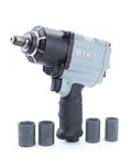 Beefy Half Inch Pneumatic Impact Wrench Pumps Out Massive Torque To Shake Off Stubborn Truck Lug Nuts And Rusty Auto Fasteners with four metric sockets.