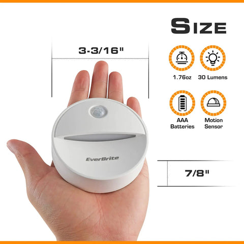 Hand holding Motion Sensor Night Light With Auto On Off, No Fuss Cool White LED Path Light For Kitchen, size details shown