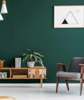 Living room with Dark Green Peel And Stick Wallpaper Removable Vinyl Self Adhesive Wall Covering For Counters Cabinets And Rooms Renter Friendly Large Roll With Grid Cut Guide 15.7 Inches By 315 Inches on wall behind chair and plants.
