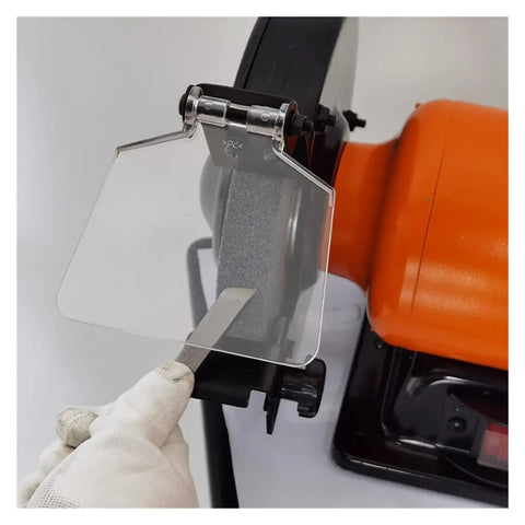 Upgrade Your Workshop With This Compact Vertical Belt Sander And Bench Grinder Combos, showing tool sharpening with clear protective shield.