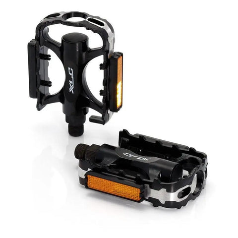 One Piece CNC Aluminum MTB Pedal With Boron Axle And Ball Bearings, 101mm By 67mm Platform, dual reflectors, angled view