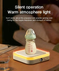 Skip The Stale Cup Stress Hooking Up This Usb Coffee Mug Warmer For Three Speed Temp Control And A Super Chill Night Light on bedside with milk bottle.