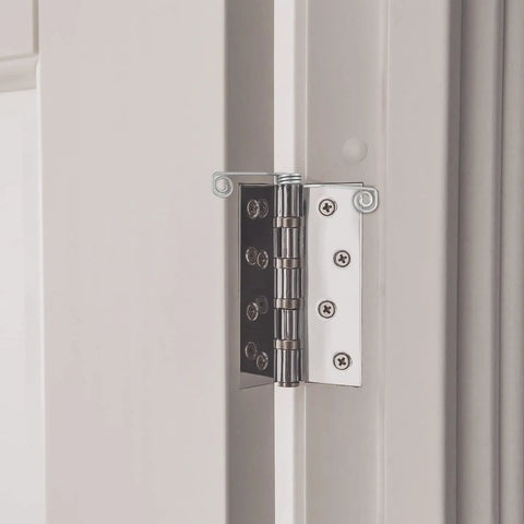 Rock Hard Stainless Steel Hinge Pin Door Stops With Butterfly Spring To Keep Doors Swingin Smooth And Stay Open No Fuss For Bedrooms Interiors Or Exterior Rooms In Pack Of Five Pieces Silver installed on a door.