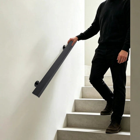Tough As Nails Flush Wall Mount Handrail Made From Premium Stainless Steel for secure indoor steps, installed on a sleek white wall.