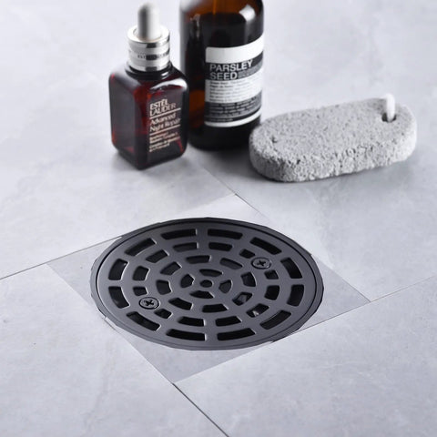 Round Shower Drain Kit Matte Black With Adjustable Base Flange 4 Inch Drain Cover With Threaded Adapter set in tile floor