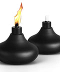 Two Pack Metal Table Top Torches with 24.5 Ounce Citronella Fuel Capacity, durable black outdoor lanterns for garden ambiance.