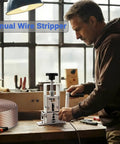 Man using Dual Drive Wire Stripper Tool For Scrap Copper And DIY Wiring, Drill Powered Or Hand Crank Copper Cable Stripping Machine