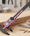 Digital Vernier Caliper 150mm Nylon Body Metric Inch on wooden surface, displaying 180mm measurement with pink body.