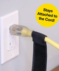 Selfie Straps 12 Inch 8 Pack Black Super Handy Stretchy Hook and Loop Cord Organizer attached to a power cord and socket.
