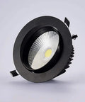 WKNHHL Recessed Lighting Housing Trim Kits Led Spotlight Aluminum Black embedded downlight showing round design and warm light.