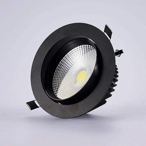WKNHHL Recessed Lighting Housing Trim Kits Led Spotlight Aluminum Black embedded downlight showing round design and warm light.