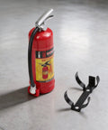 Beefy Solid Red Plastic Simulation Fire Extinguisher For 1/8 Scale Rc Rock Crawler Rig with holder on gray floor