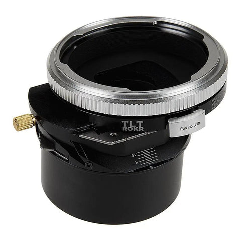 Tilt Shift Lens Mount Adapter For Sony E Mount Using Pentacon 6 Kiev 60 Lenses, Delivers 20mm Shift, 10 Degree Tilt, And 360 Degree Rotation, Built Tough For Pro Level Architectural, Product, And Landscape Photography. Black metal tilt-shift lens mount adapter with silver ring and shift lever