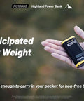 Ultralight 10000mAh Power Bank With Built In Flashlight 50 Lumens Dual LED USB C Fast Charge 20W TSA Approved held in hand.