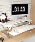 Ergonomic Height Adjustable Standing Desk With Smooth Rolling Casters Straight Up Solid Mobile Workstation in white, set for home office.