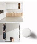 Badass White Round Cabinet Knobs For Kitchen And Farmhouse Drawers Boasting A Super Clean Slick Design Sturdy Zinc Build With No Hassle Quick Install Mounting Screws Included Tight Grip Handles 10 Pack in a modern kitchen setting.