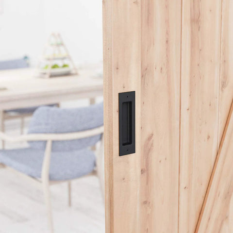 6 1/2 Inch Matte Black Frosted Flush Pull For Sliding Barn Doors installed on wooden door